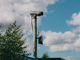Close-up of rusty surveillance camera