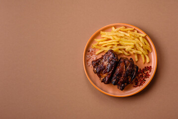 Grilled or barbecued pork ribs with sauce. Grilled ribs