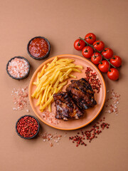 Grilled or barbecued pork ribs with sauce. Grilled ribs
