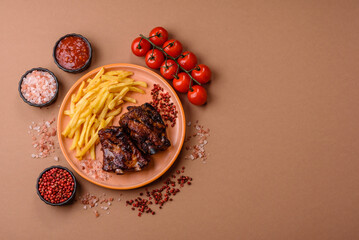 Grilled or barbecued pork ribs with sauce. Grilled ribs
