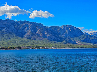 Mountains in the clouds in sunny day