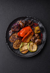 Grilled vegetables, bell peppers, mushrooms, and zucchini, a vegetarian meal. Grilled vegetables