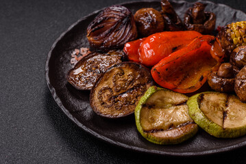 Grilled vegetables, bell peppers, mushrooms, and zucchini, a vegetarian meal. Grilled vegetables