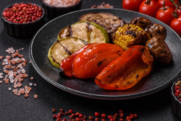 Grilled vegetables, bell peppers, mushrooms, and zucchini, a vegetarian meal. Grilled vegetables