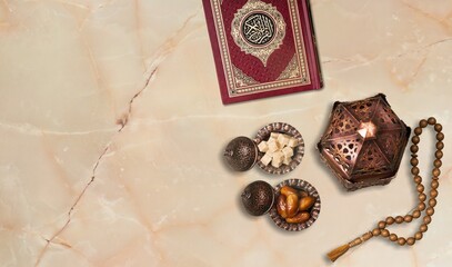Ornamental Arabic lantern and dates on plate