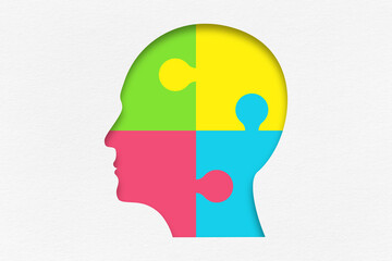 Autism Awareness and Neurodiversity Symbol with Puzzle Head. Head shape made of colorful puzzle pieces.