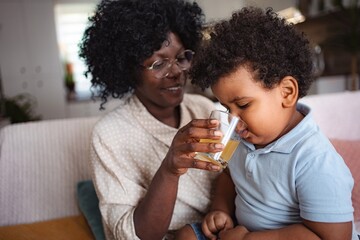 Doctor performing routine checkup on child