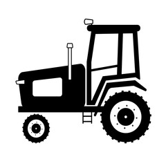A tractor silhouette. A tractor vector black clip-art isolated on a white background. 