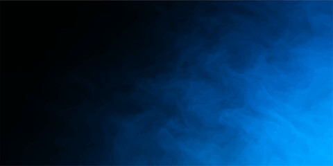Obraz premium Bright blue smoke and mist against a dark black background creating a striking texture like a night sky