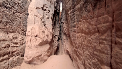 A trip to Sahara desert in Algeria. Beautiful 
african travel photo. Landscape with mountains, rocks and nature. Summer vacation in arab country.
