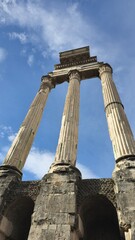 Rome, Italy - 13 January 2025. The Temple of Castor and Pollux features three fluted columns atop a...