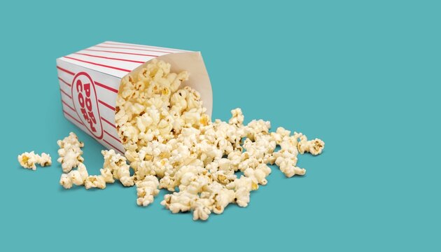 A classic striped popcorn box with delicious popped popcorn