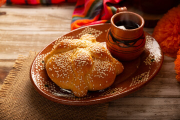 Pan de Muerto. Typical Mexican sweet bread that is consumed in the season of the day of the dead. It is a main element in the altars and offerings in the festivity of the day of the dead.