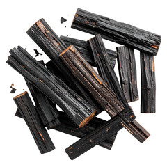 Close-up of many dark, rectangular, woody pieces scattered on black