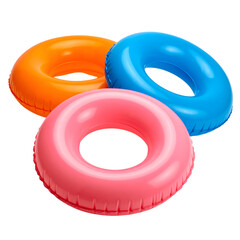 Three vibrant, inflated swimming rings in orange, pink, and blue, arranged on a black background