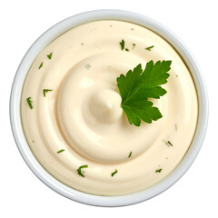 Creamy, light-colored sauce in a white bowl, swirled, with parsley garnish