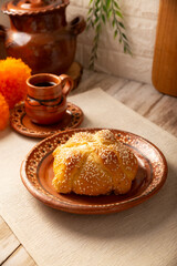 Pan de Muerto. Typical Mexican sweet bread that is consumed in the season of the day of the dead. It is a main element in the altars and offerings in the festivity of the day of the dead.