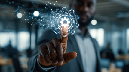Businessman engages with a digital gear interface, representing technology and innovation in a modern workspace, emphasizing efficiency and professional development