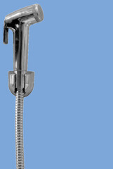 close up of bidet spray pixelate grayscale color halftone dotted texture style collage element isolated on blue background