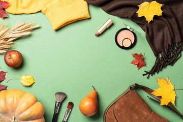 Autumn cloth and accessories at white background.