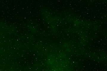 Green galaxy space background. Starry night sky background. Night sky with stars.