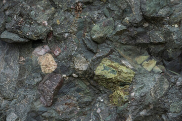Conglomerate rock consisting rounded clasts