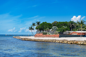 Tropical beach and Fort Zachary Taylor in Key West, Florida under sunny blue sky