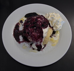 Dumpling with blueberries and whipped cream in Czech Republic, Europe
