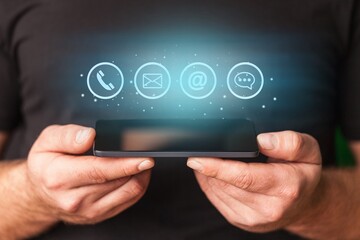 contact customer support icons in business hands