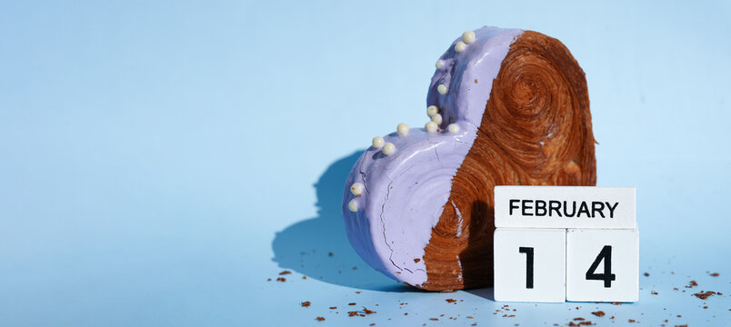 Calendar date 14 February greeting card Delicious fresh croissant topped with colorful flavor Ganache. Creation unique heart shape bakery. Puff pastry holiday love gift present idea Valentine's day - Powered by Adobe