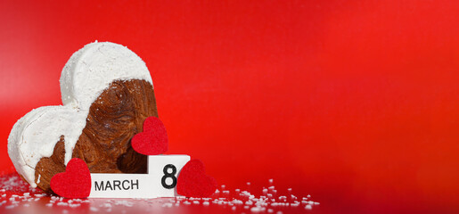 Calendar date 8 march Women's day greeting card Delicious fresh croissant topped with colorful flavor Ganache. Creation unique heart shape bakery. Puff pastry holiday love gift present idea. Copy