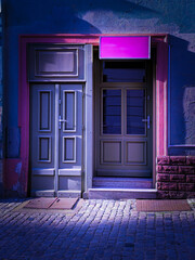 urban street with two vintage doors under glowing magenta sign, night city scene in violet blue tones, creative architecture lighting concept