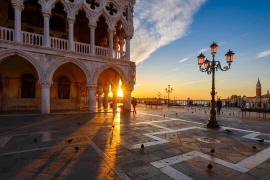 Sunrise view of piazzetta San Marco, Doge's Palace (Palazzo Ducale), Colonna di San Marco in Venice, Italy. Architecture and landmark of Venice. - Powered by Adobe
