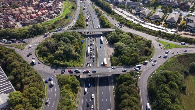 Aerial video above M4 Motorway at junction 12 Reading, UK
