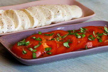 Fresh caprese salad with juicy tomatoes, creamy mozzarella, and vibrant basil