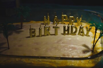 Strawberry Cake with Cream Cheese Frosting and Golden Decorations