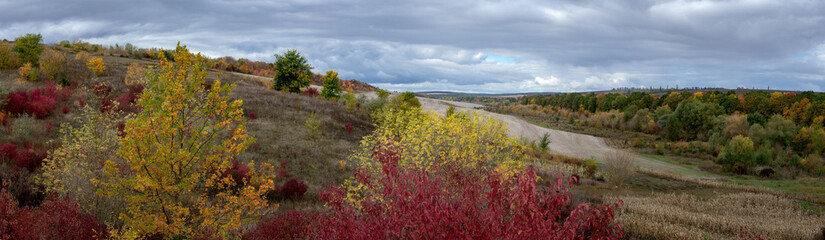 Autumn in all its glory. A rugged landscape. A panoramic view of the surrounding area on an autumn day.