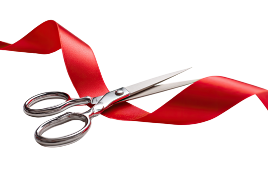 Scissors cutting a red ribbon