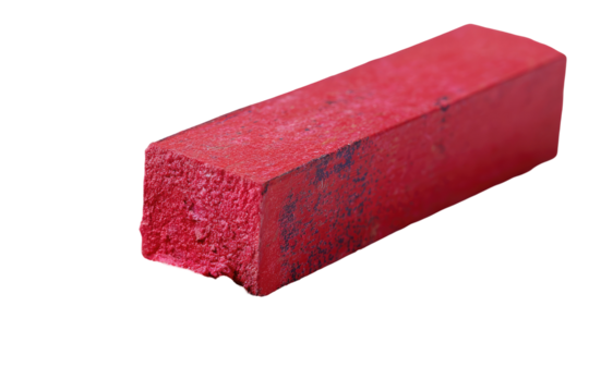 A red rectangular crayon, chipped and worn