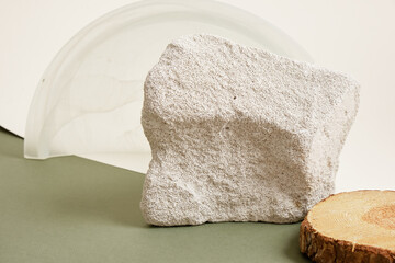 Round Wood cut podium, stone, decorations concept over beige Background for perfume, jewellery and cosmetic products.