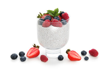 Glass of tasty chia seed pudding with mint leaves and berries on white background