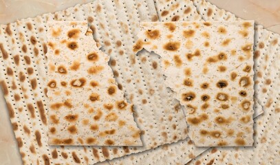 Matzah bread jewish food broken into two pieces