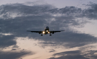 Stunning View of Plane Flying Through Sky Clouds