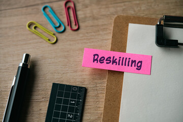 There is sticky note with the word Reskilling. It is as an eye-catching image.