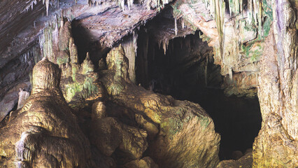 cave in thailand limestone stalactites darkness wilderness nature raw