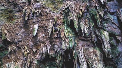 cave in thailand limestone stalactites darkness wilderness nature raw