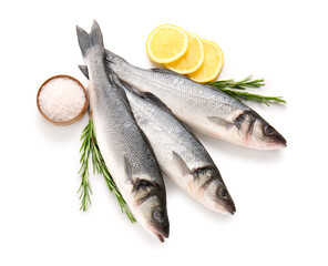 Fresh seabass fish, slices of lemon, rosemary twigs and bowl with salt isolated on white background, closeup