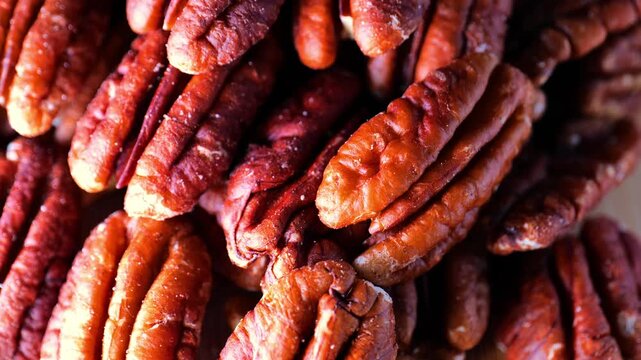 Pecan nuts.Organic Bio Nuts. vegetarian protein source. Useful healthy snack.4k footage