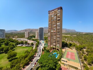 A Modern HighRise Building That Overlooks Expansive Green Landscapes and Stunning Views