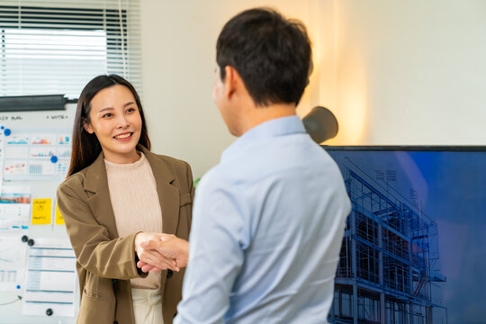 Corporate business team meeting discussion with project manager in office conference room. Group of Business people teamwork shaking hands after success production plan. - Powered by Adobe